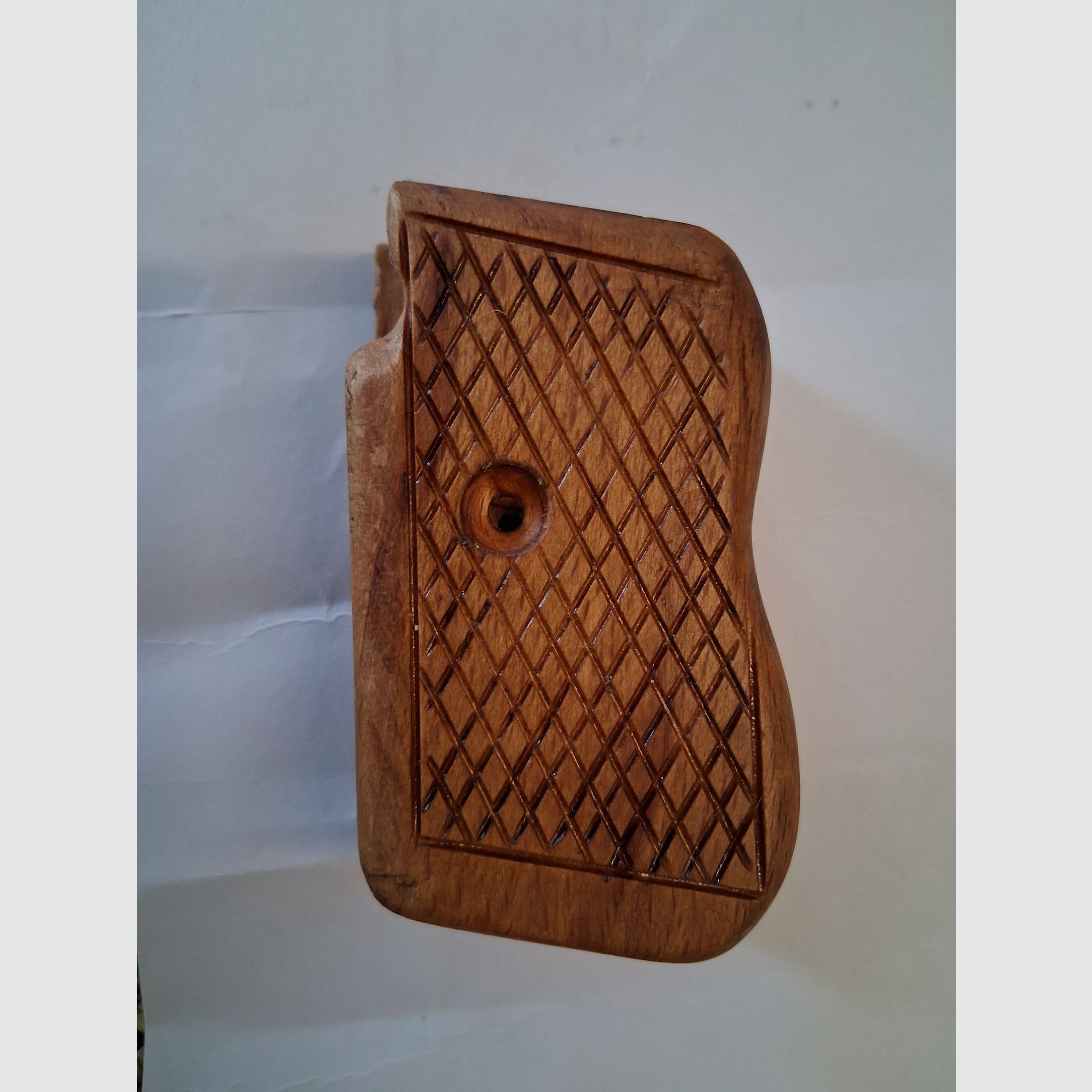 Wooden grip panel for old Mauser pistol