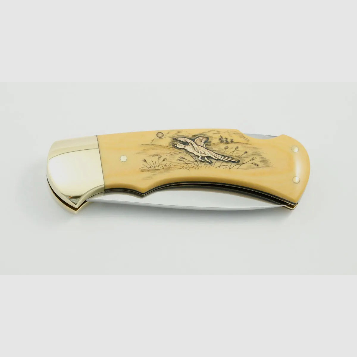 (Rarities) Puma 4-Star 715 with brass inlays duck and pheasant, warranty card, 1983