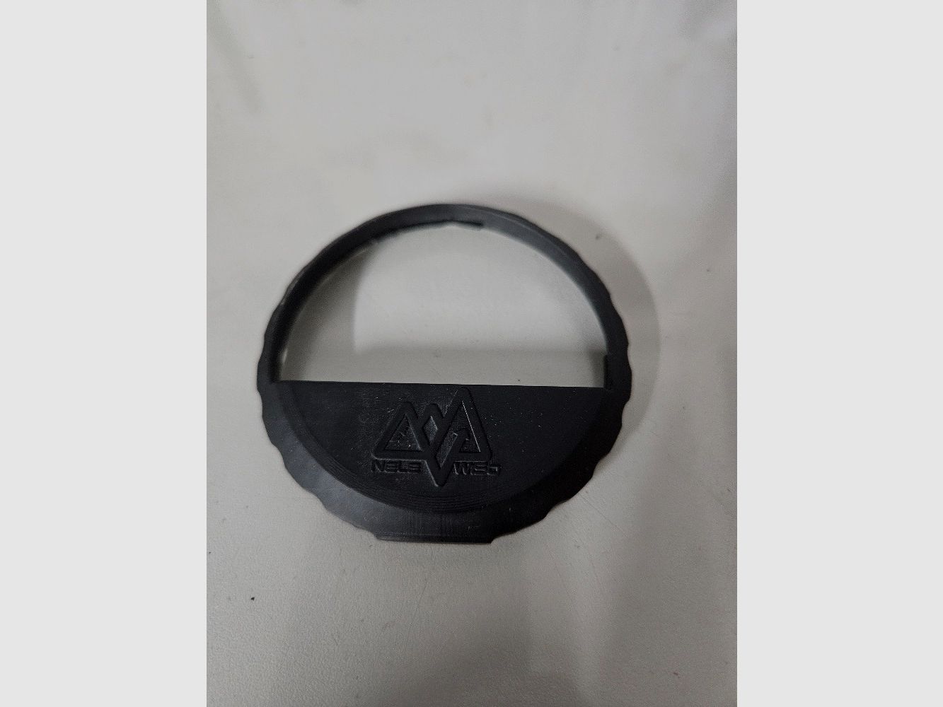 Objective lens aperture sound suppressor anti-reflection