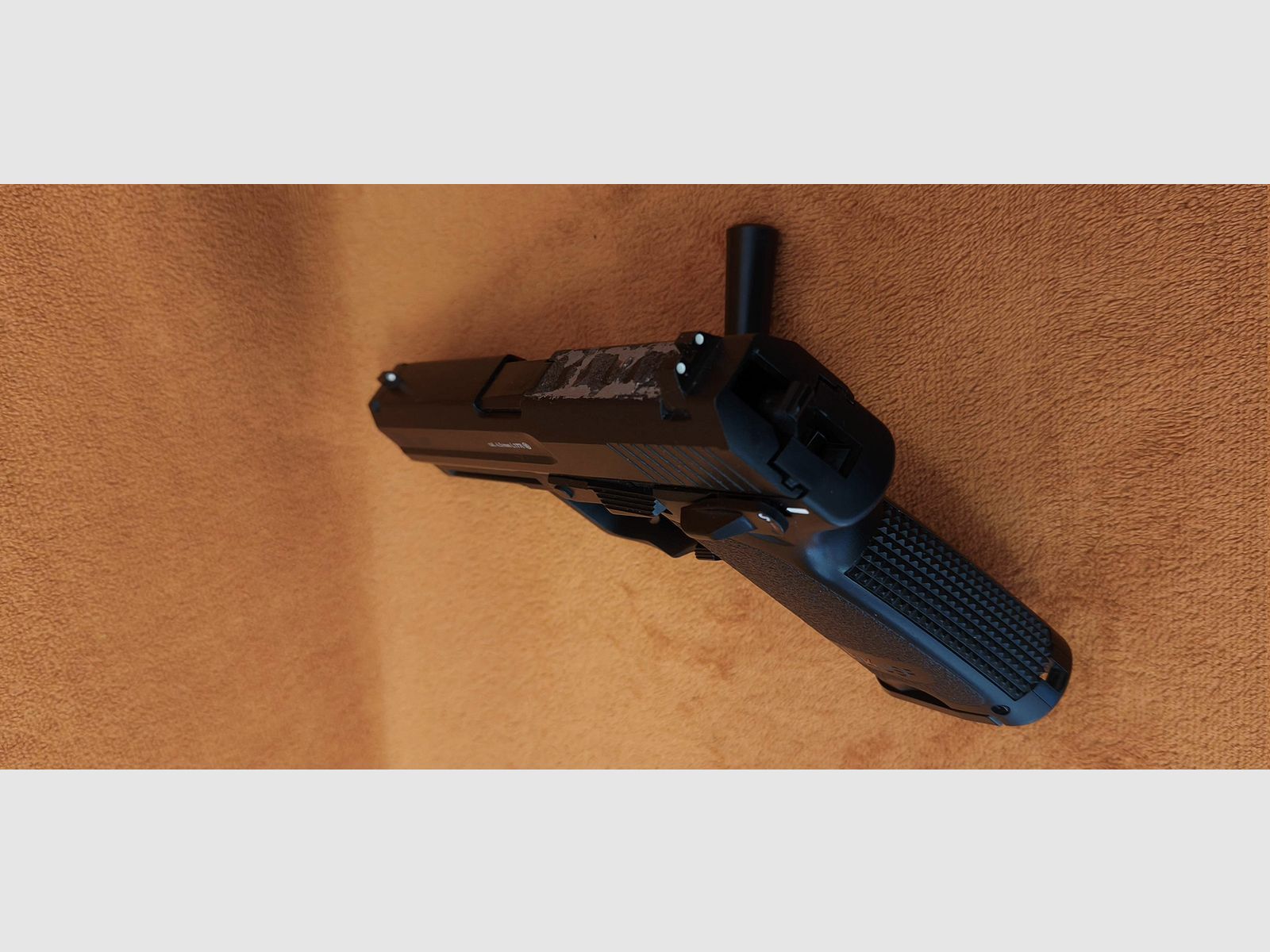 HK USP CO2 air pistol 4.5mm steel BB with signs of use
