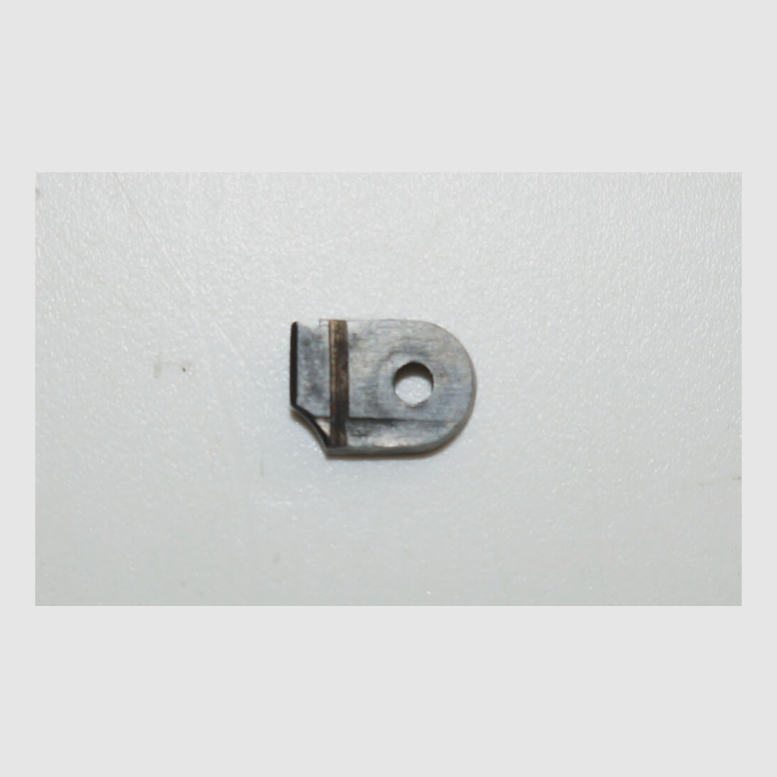 Placa de percutor usada para revólver de ordenanza suizo 1882, fábrica de armas de Berna