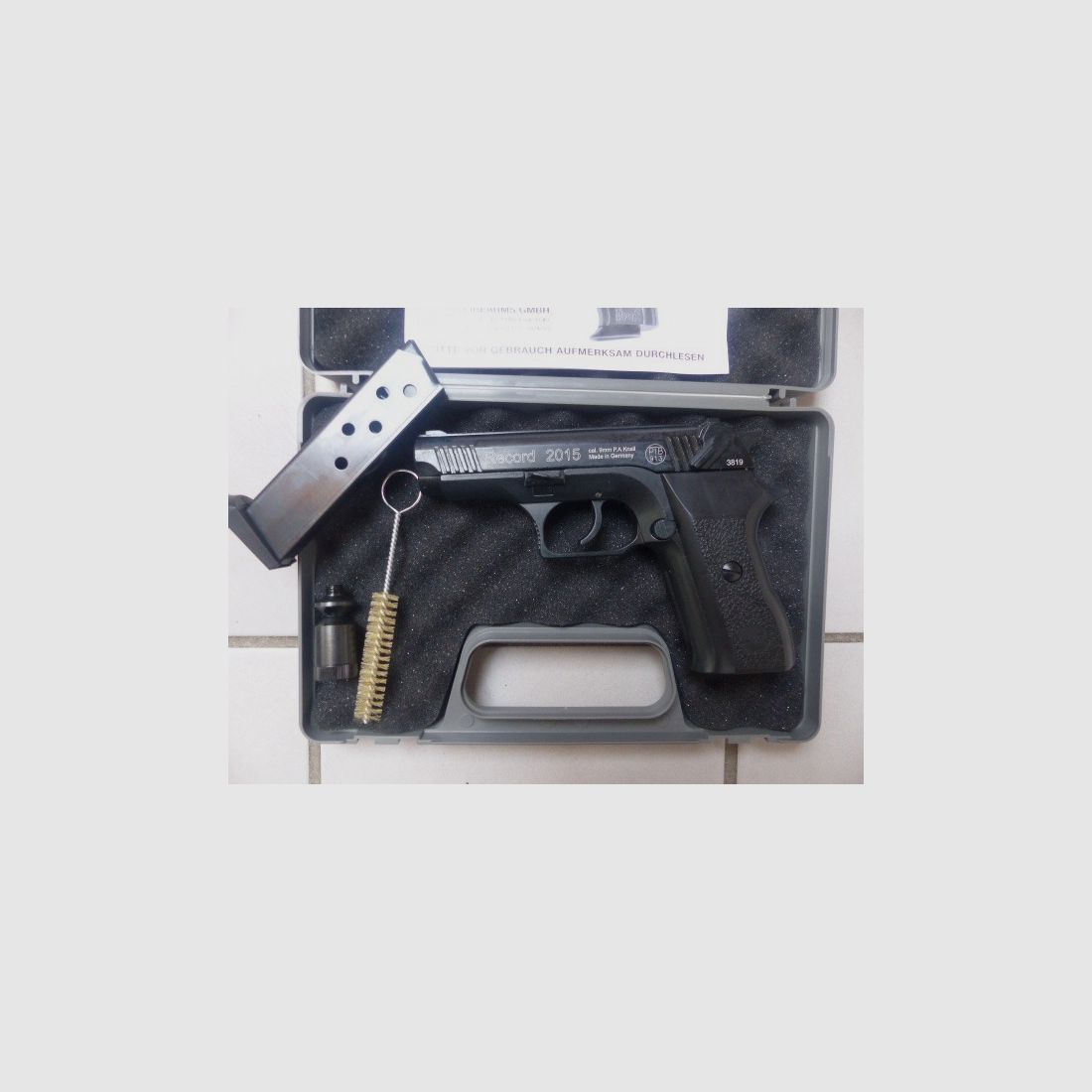 Record 2015 Cal. 9mm PAK New with case, blank firing adapter, brush, manual from collection plus 50 rounds of ammunition