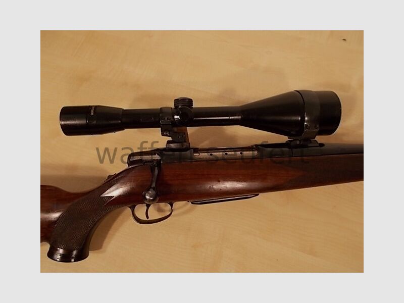 Sauer 80 con Kahles 8x56A4 y SWM