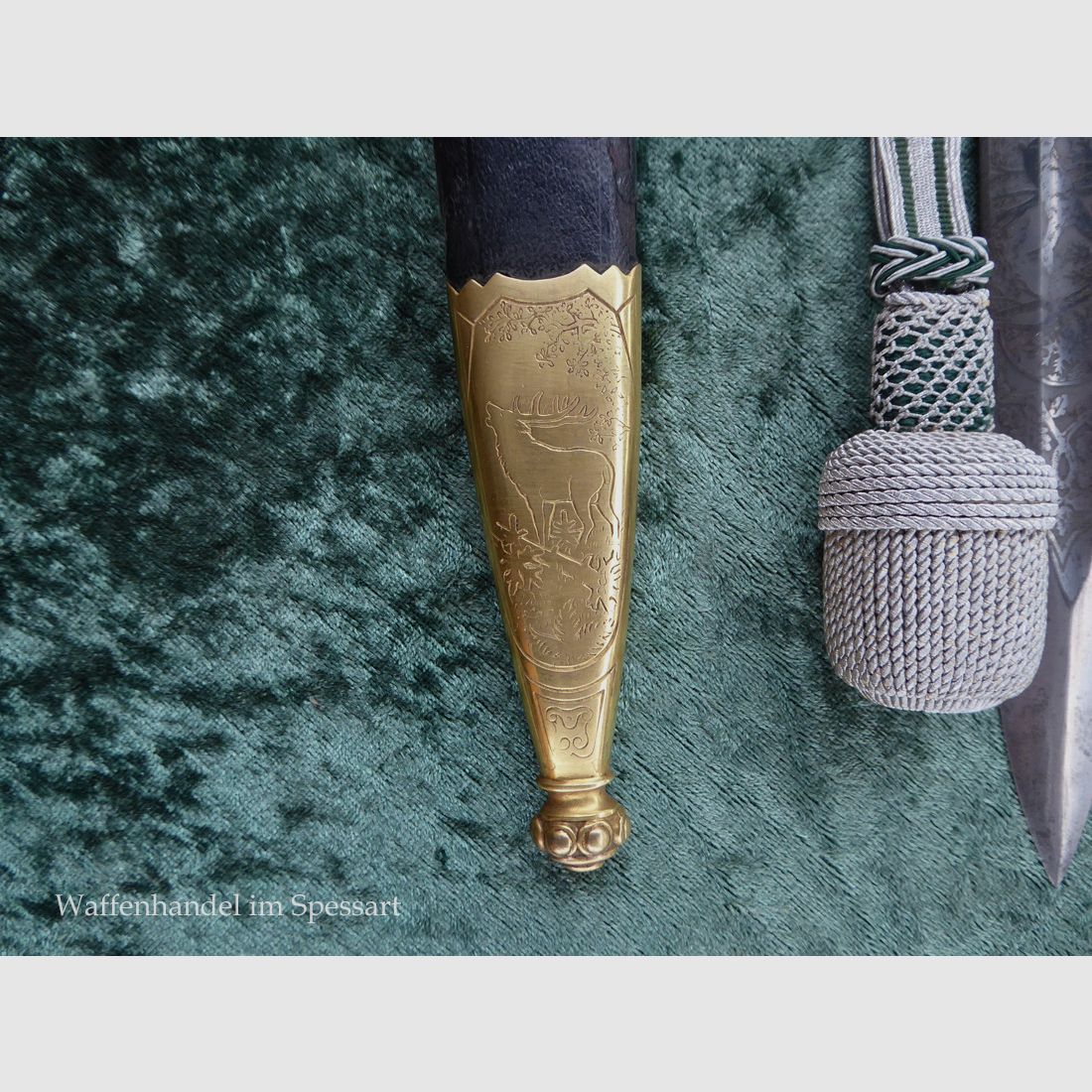 Stag knife with a guard vessel in ornate design from the time of World War II.