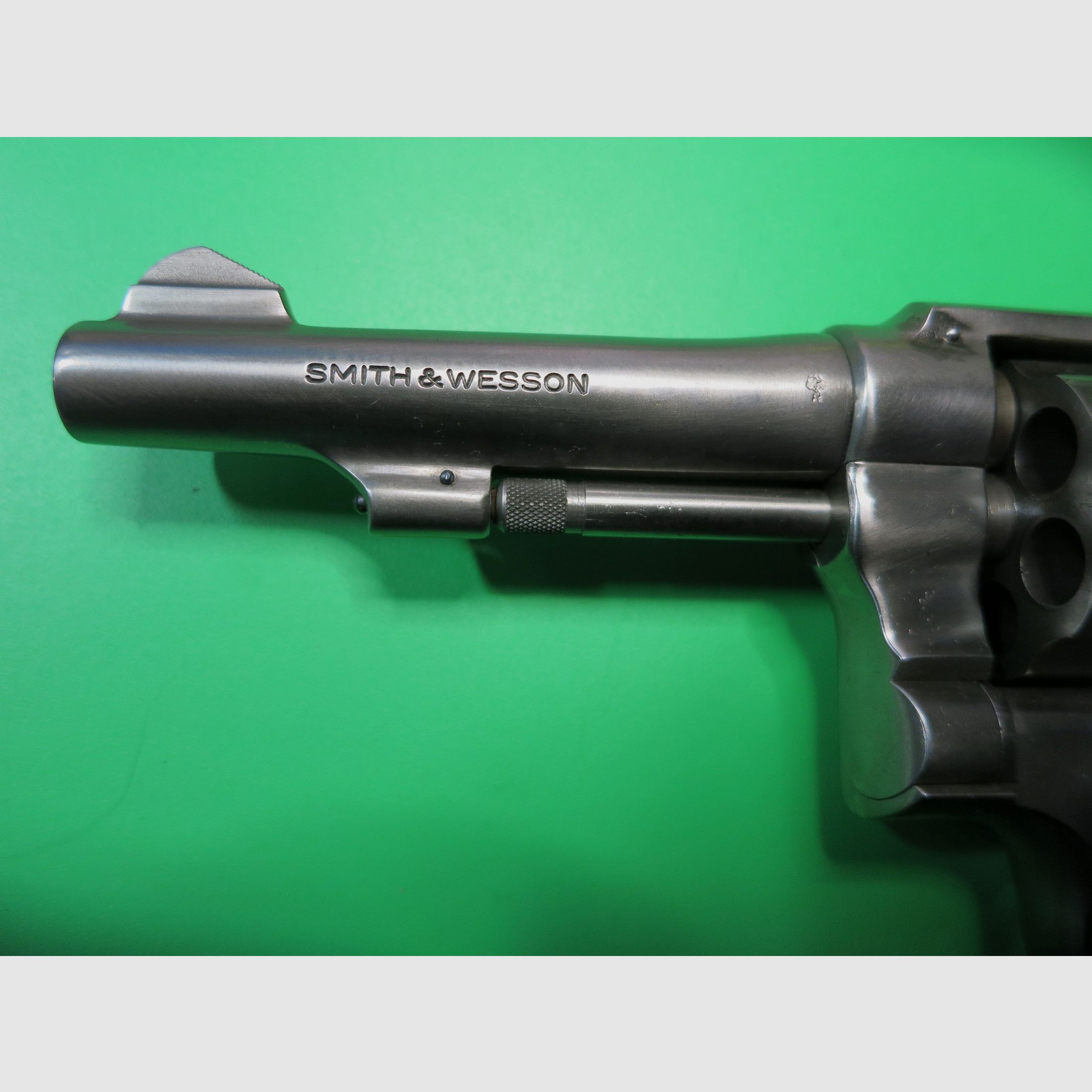 Smith & Wesson Mod. 10-5 (like Victory), .38 Special, 4" barrel, stainless steel, classic catch shot #82