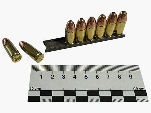 8 pieces of decommissioned 9x19 / 9mm Para VM on loading strips