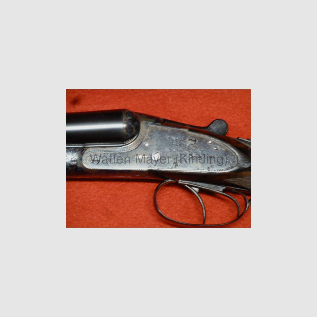 Fusil à double canon avec serrure latérale Suhl