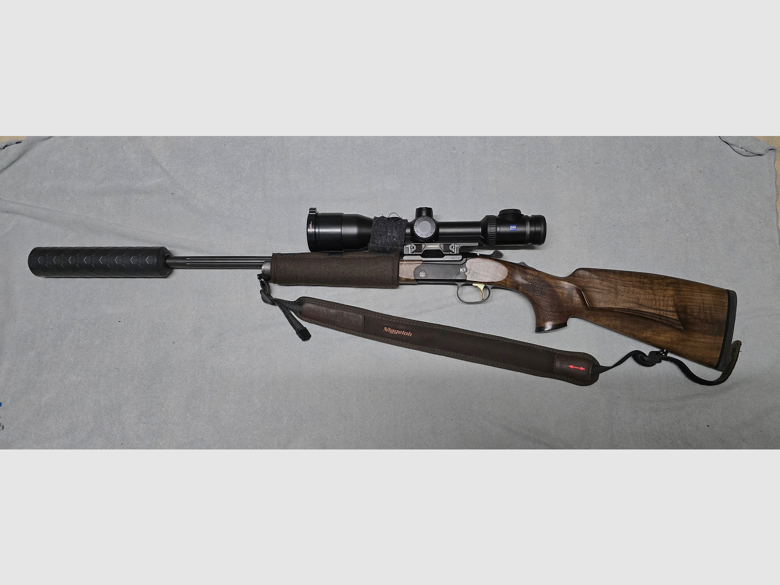 Merkel K5 Extrem with ZEISS V8 1.8-14x50 riflescope with rail and VANWARD Hunter PRO, overbarrel titanium suppressor for caliber .30