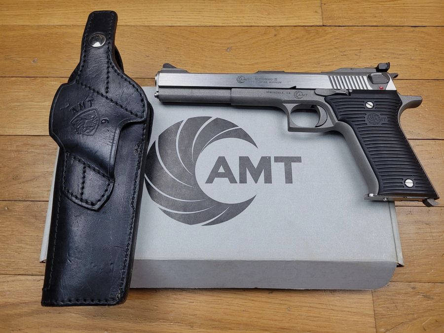 Très beau et rare pistolet Automag II – Calibre 22 Magnum – Fabrication AMT – Acier Inox de A à Z – Rare six pouces – Excellent état mécanique – Boîte d&rsquo;origine – 3 chargeurs – Holster custom de marque Pony – État neuf!, image 21 sur 21