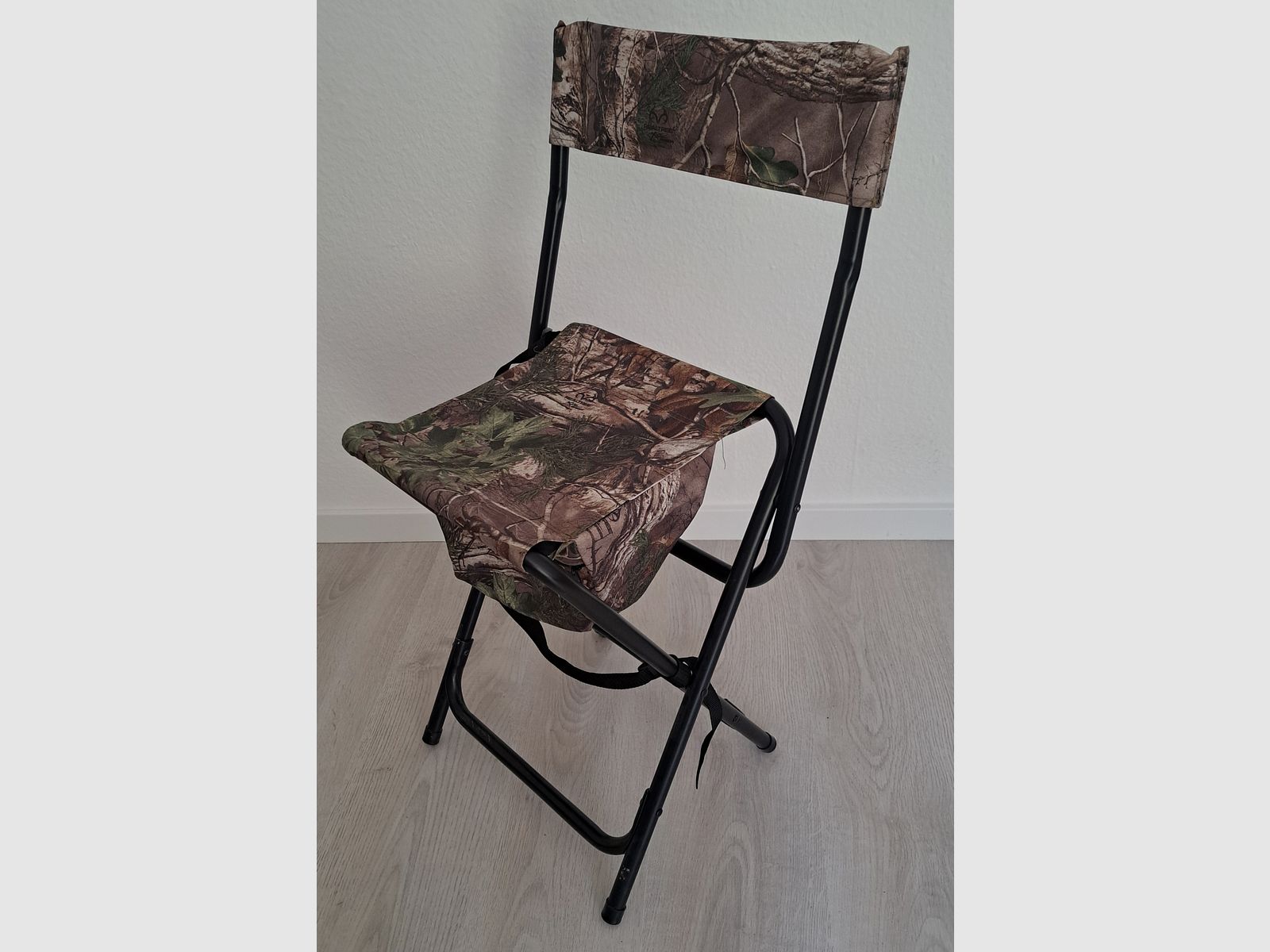 Hunting Ameristep folding chair with storage compartment