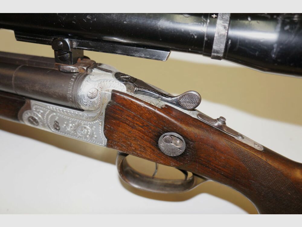 Krieghoff Drilling, Krieghoff, Kal.7x57R / Kal.16/70, mit GECO Zielfernrohr und schönen Gravuren