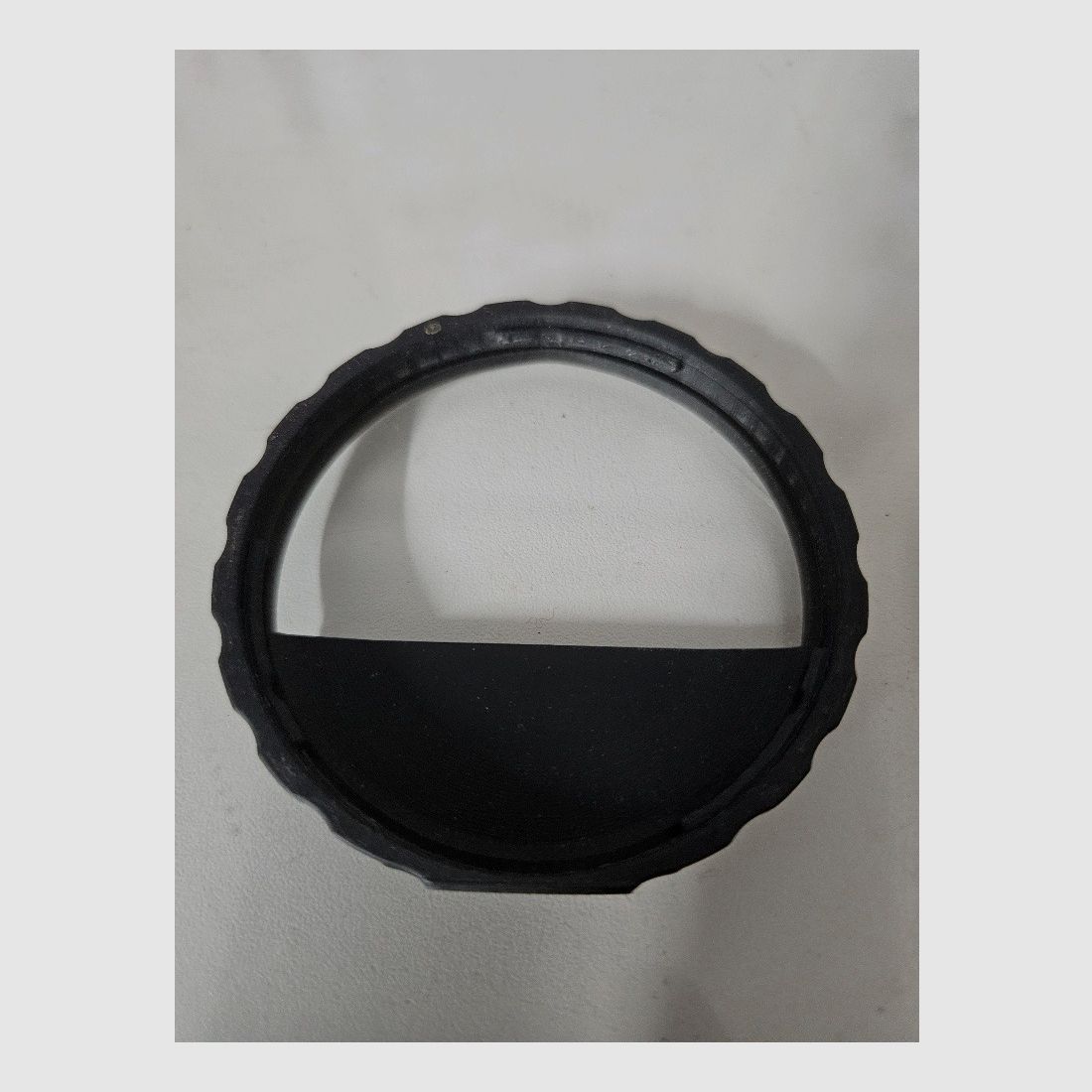 Objective lens aperture sound suppressor anti-reflection