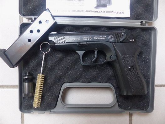 Record 2015 Cal. 9mm PAK New with case, blank firing adapter, brush, manual from collection plus 50 rounds of ammunition