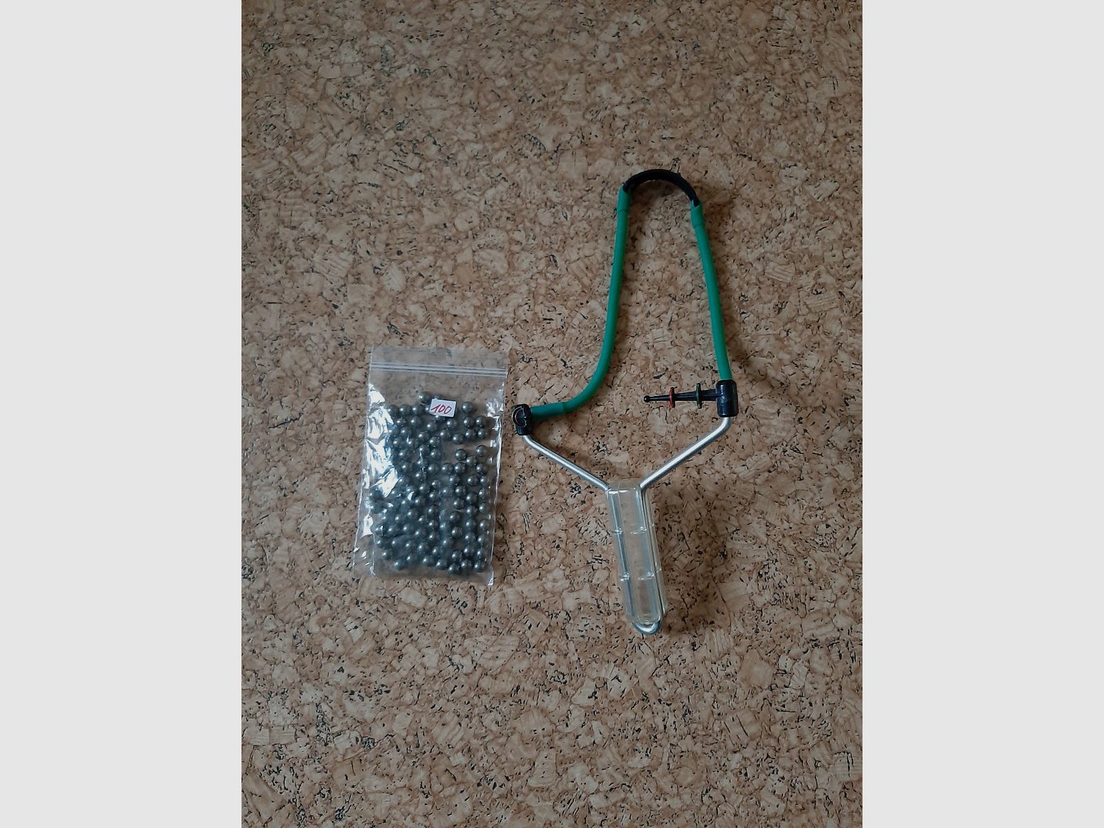 Slingshot with 100 steel balls
