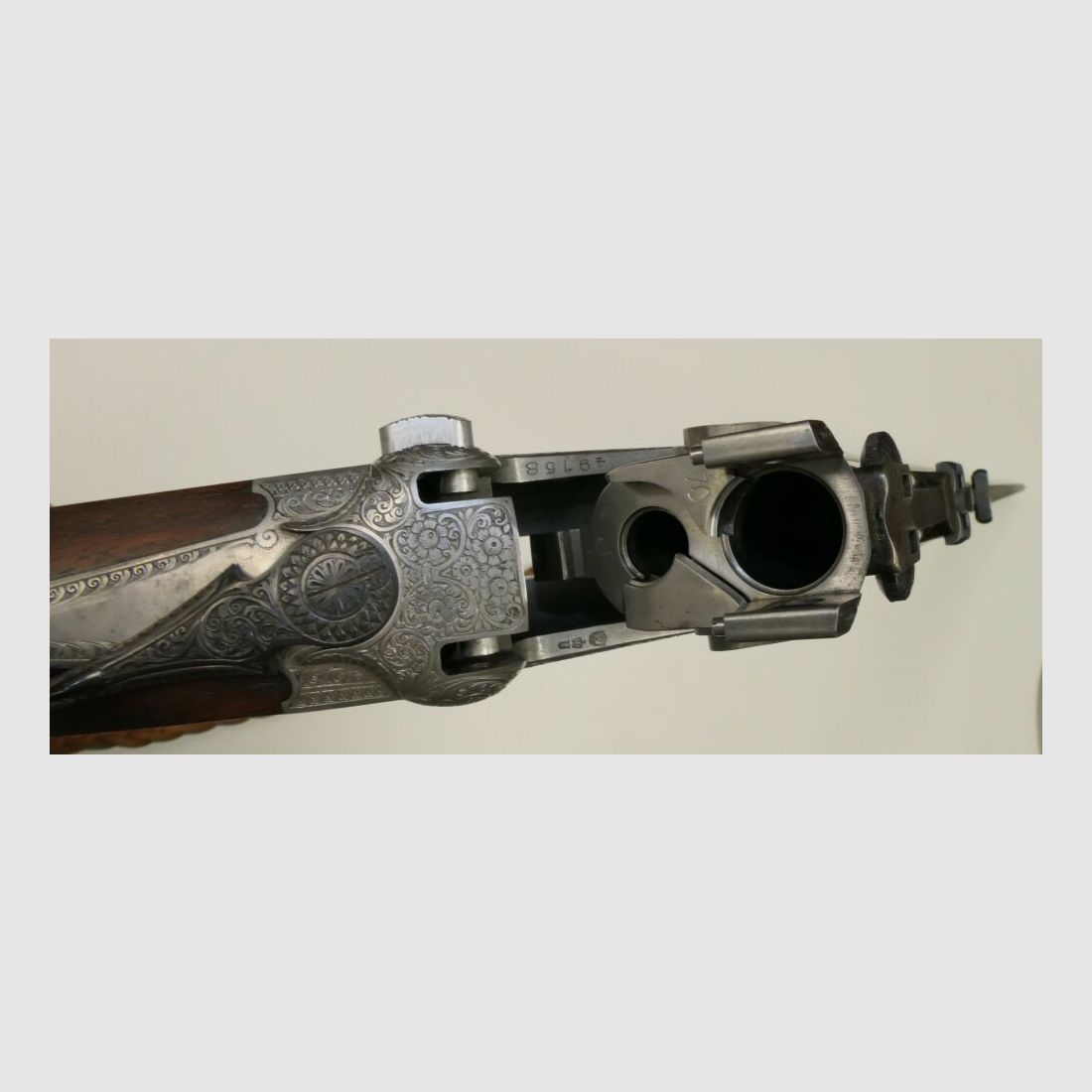 Merkel E313 mit jagdlichen Tiergravuren