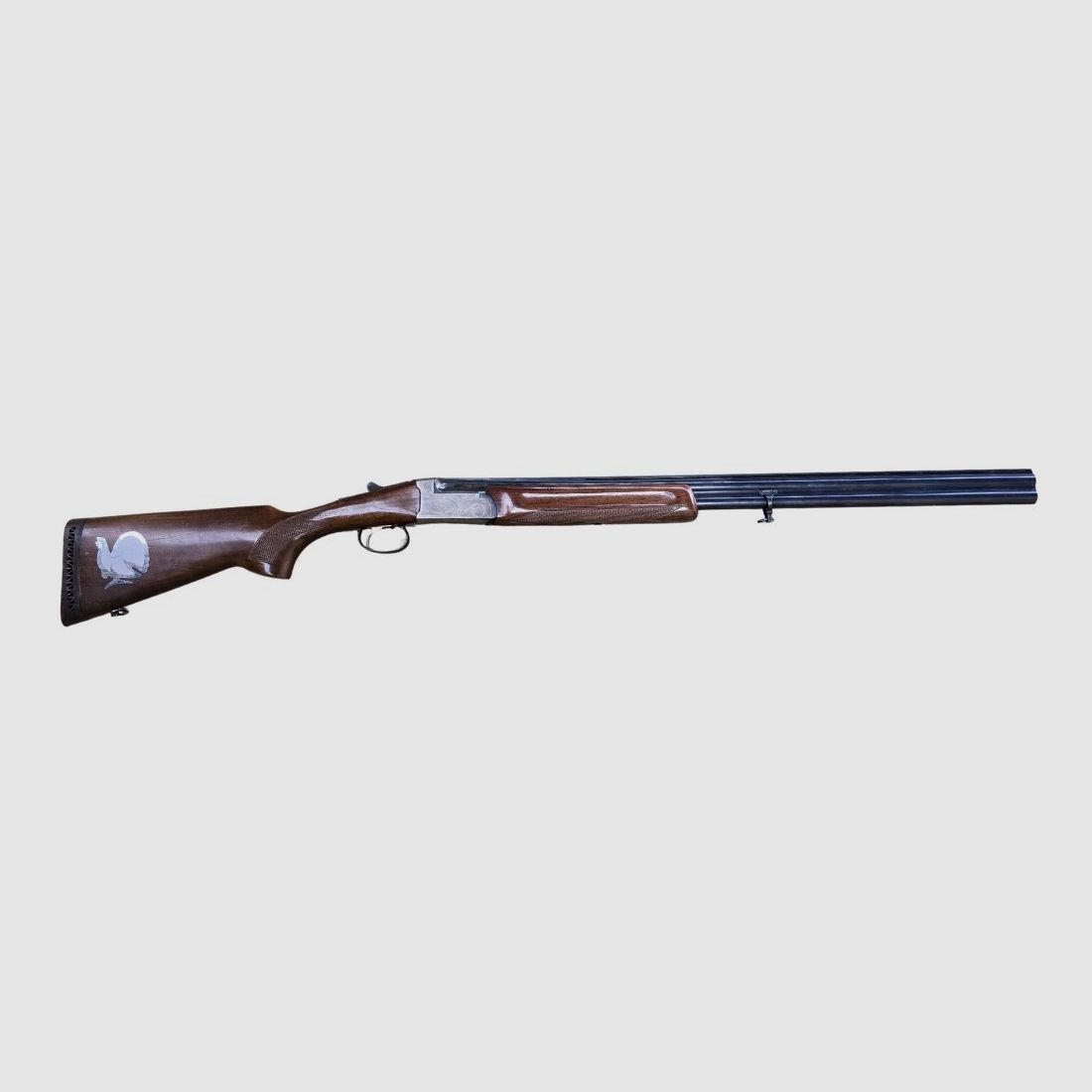 used FAUSTI over-and-under shotgun with single trigger and ejector, barrel length 71cm fixed choke 1/1-3/4, condition Good, image 1 of 7