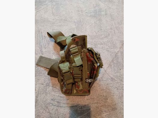 Pistol holster   Thigh holster