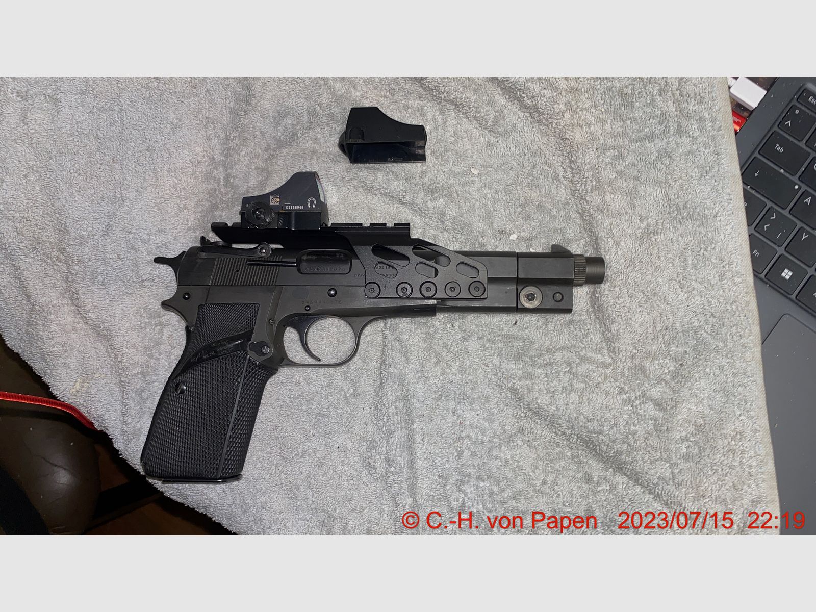 Browning FN HP Competition pistol with 6" barrel caliber 9mm Luger & spare magazine 17 rounds