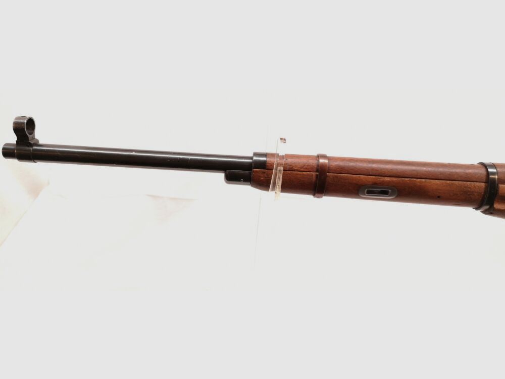 Karabin treningowy Mosin Nagant - karabin treningowy, z numerami zgodnymi, przedni metalowy uchwyt w kolorze brązowym.