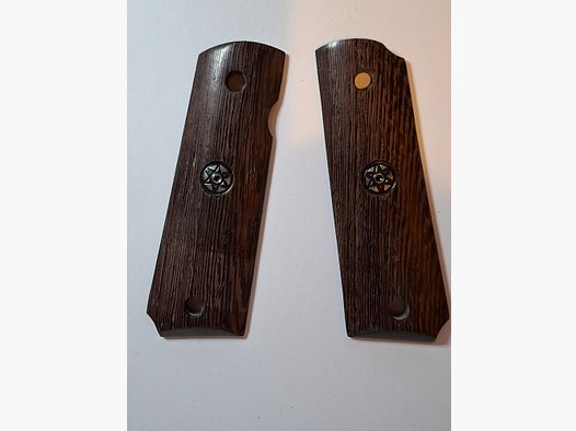 Griffschalen der Cold 1911 oder ME Sport 1911, siehe Bild.