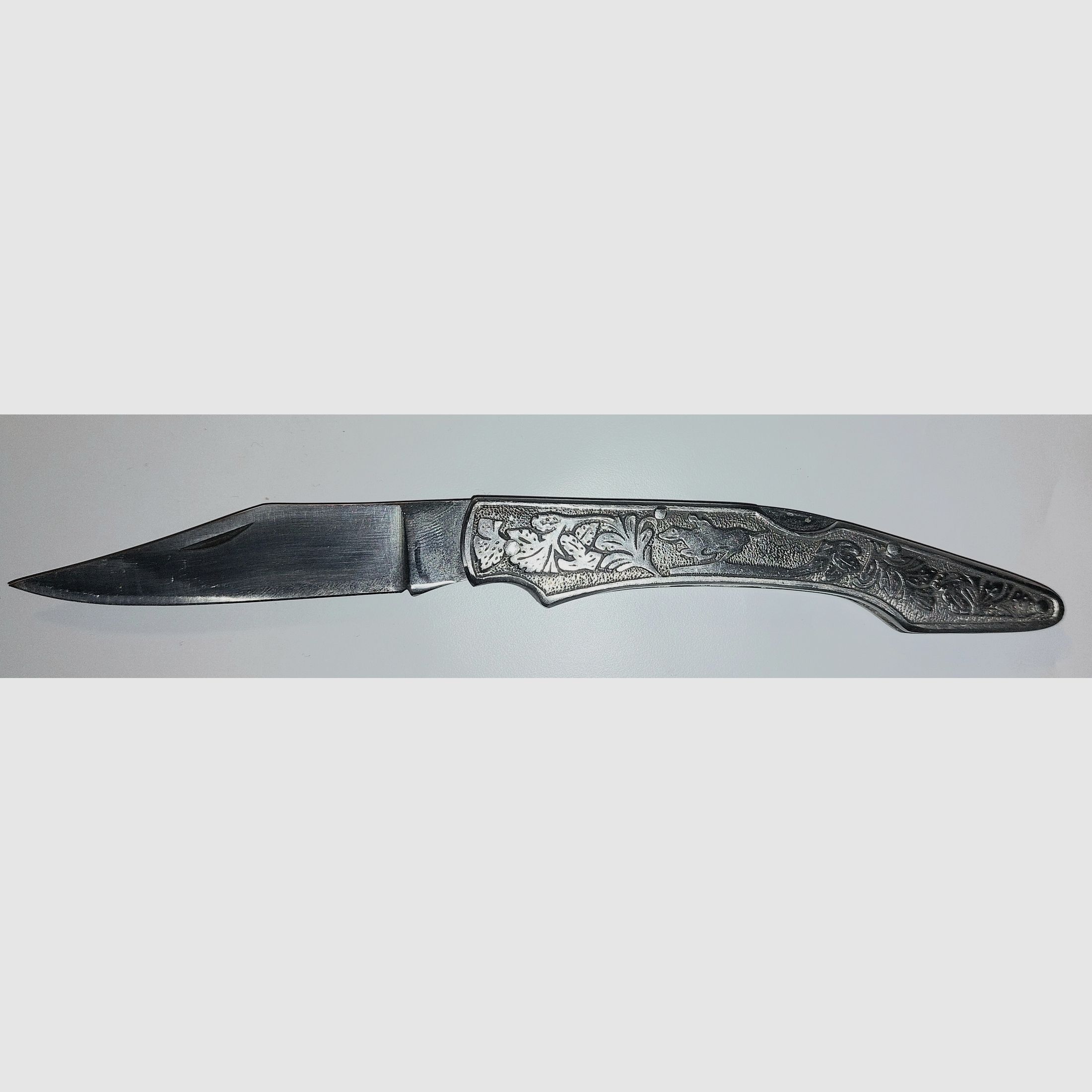 Pocket knife with rider motif, price negotiable