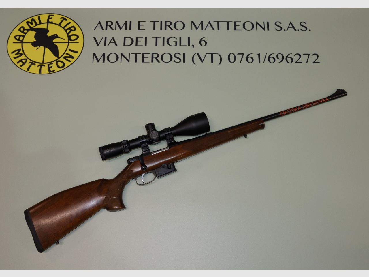 caliber 223 Rem including optic