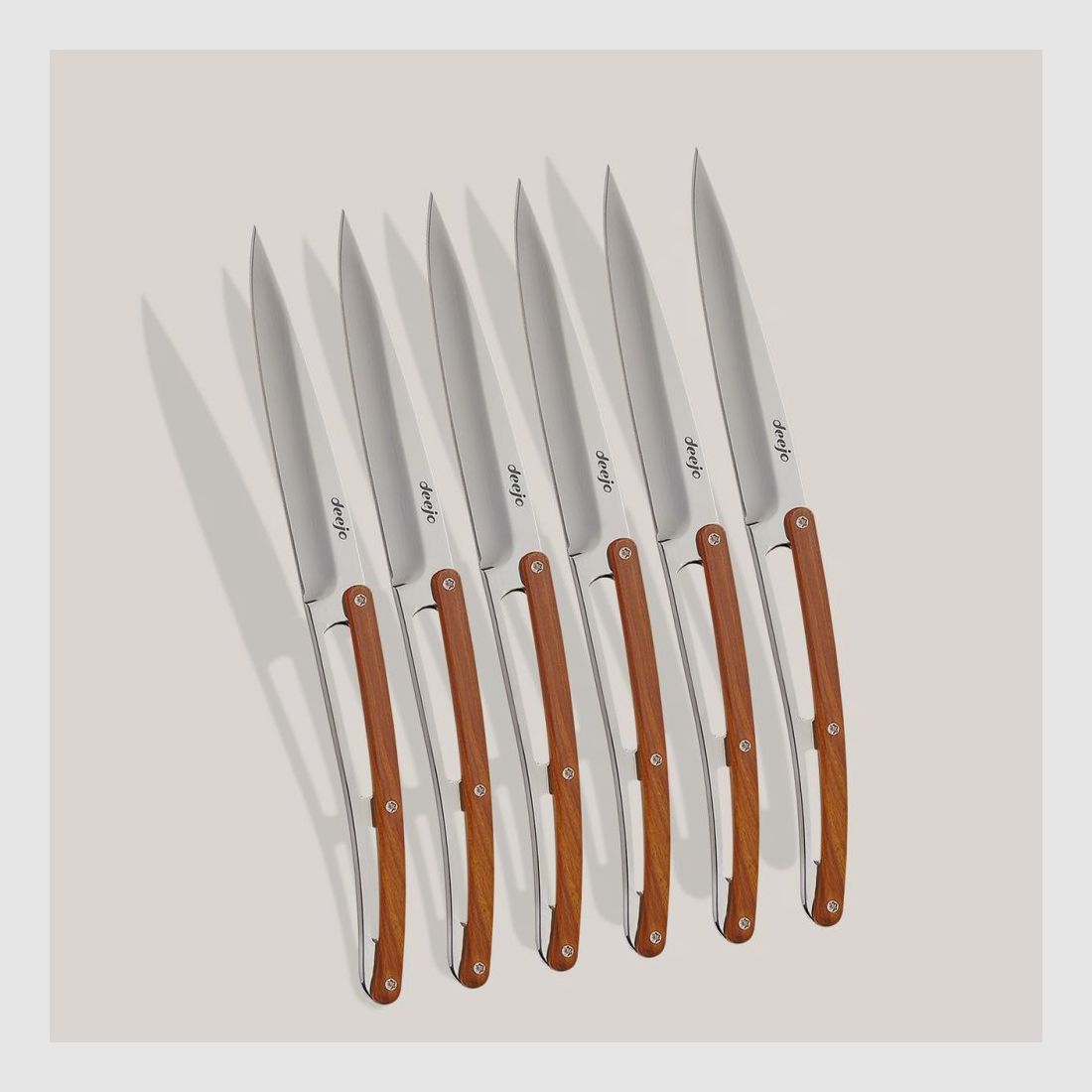6 Deejo steak knives, coral wood