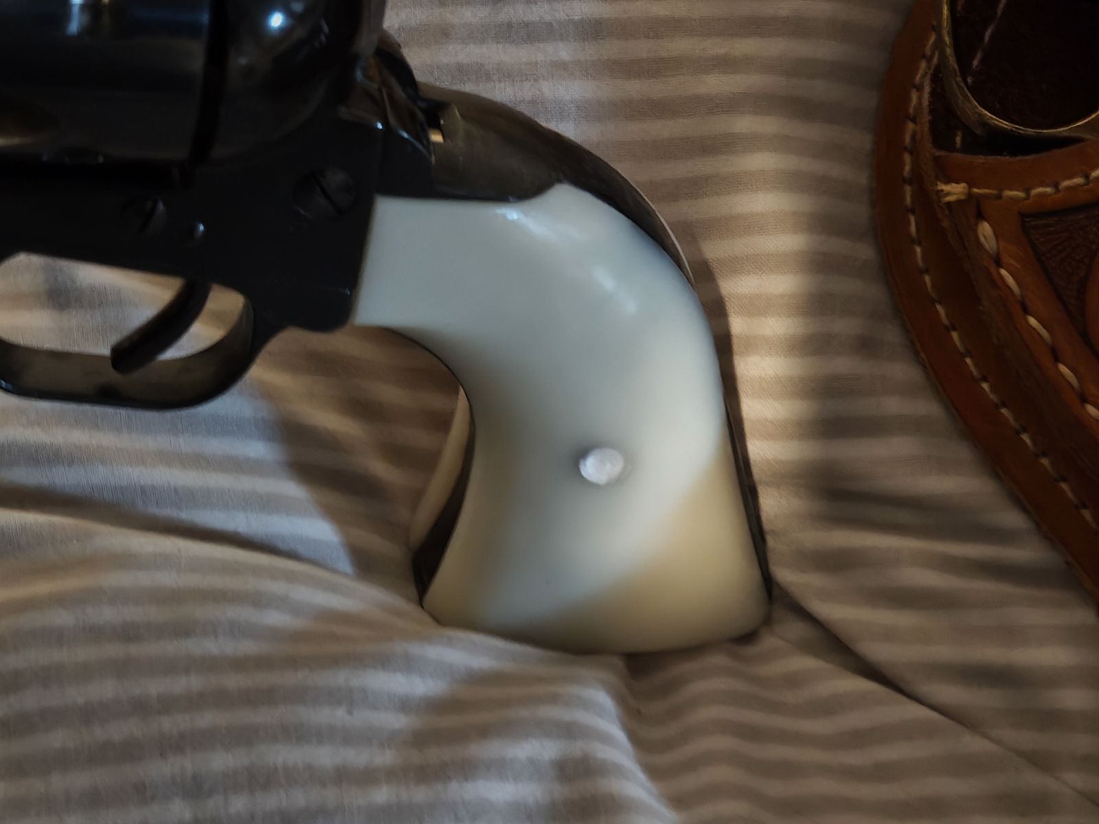 Weihrauch Western Single Action (SAA) revolver with the PTB 788 with white grip panels