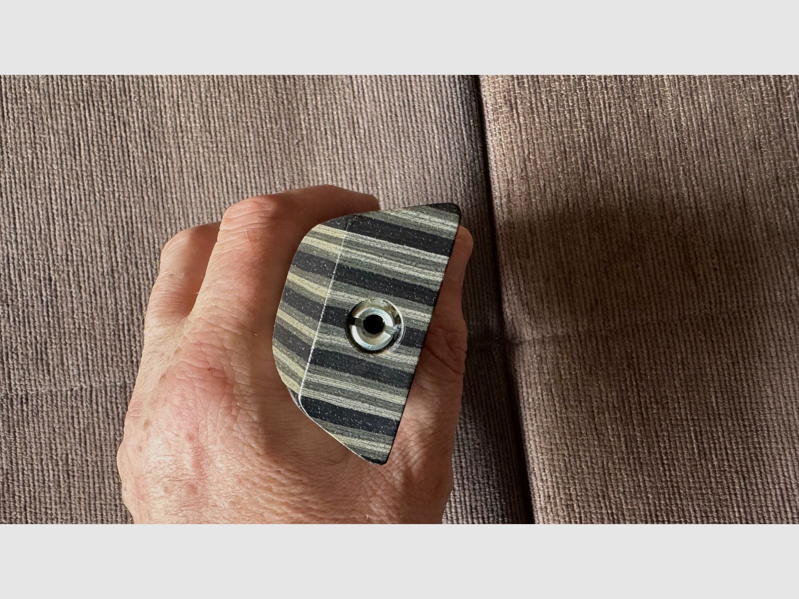 Feinwerkbau 700 cheek piece made of laminated wood.