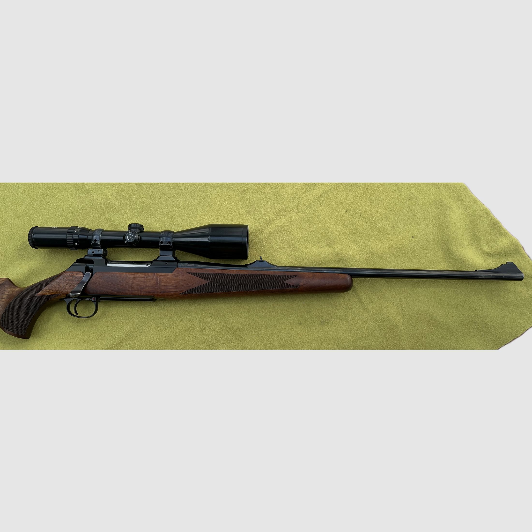 Rifle Sauer Modell 200 caliber .243Win. with scope Schmidt & Bender with very good shooting performance