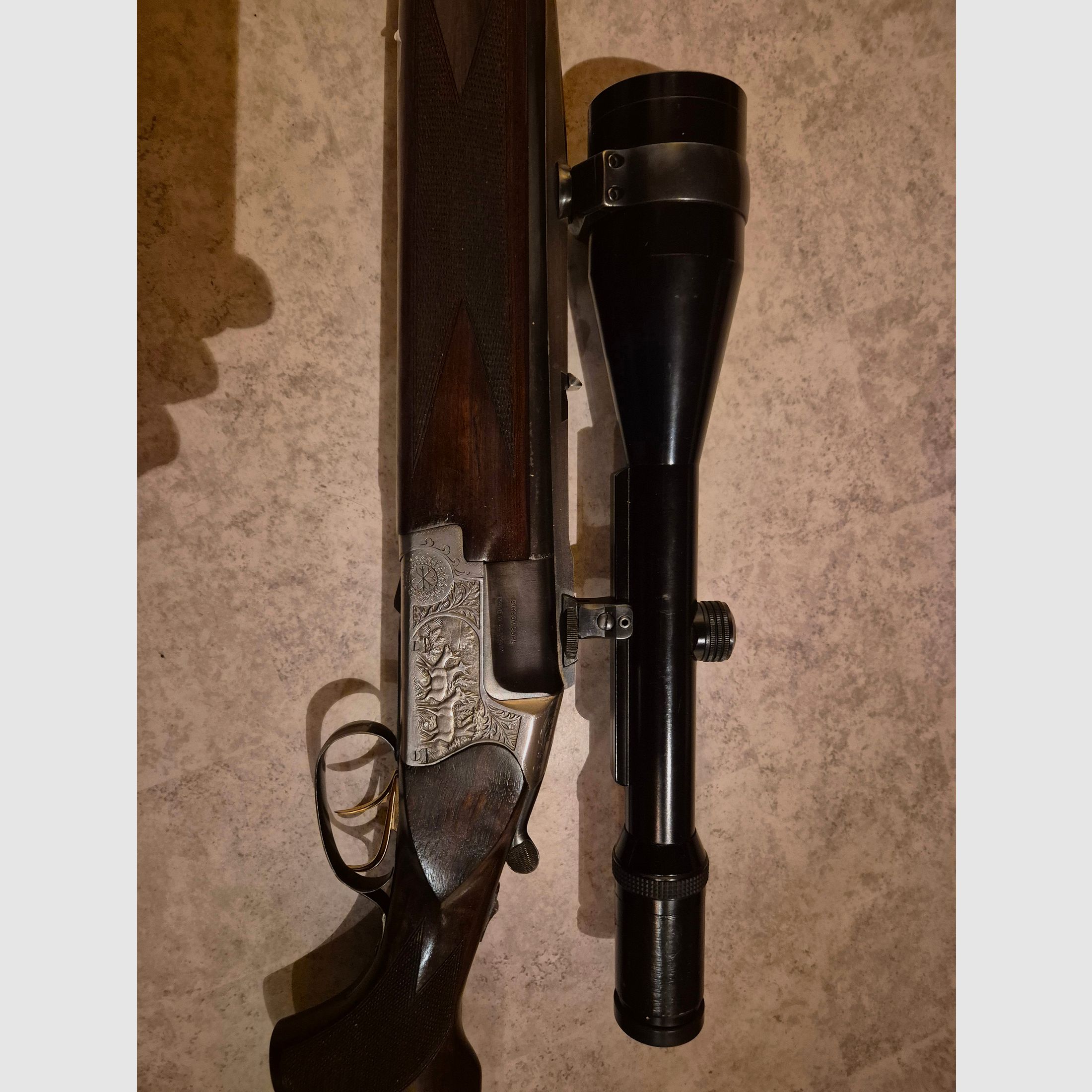 Suhler BBF 8x57IRS-12/70 con 3-12x56 Kahles