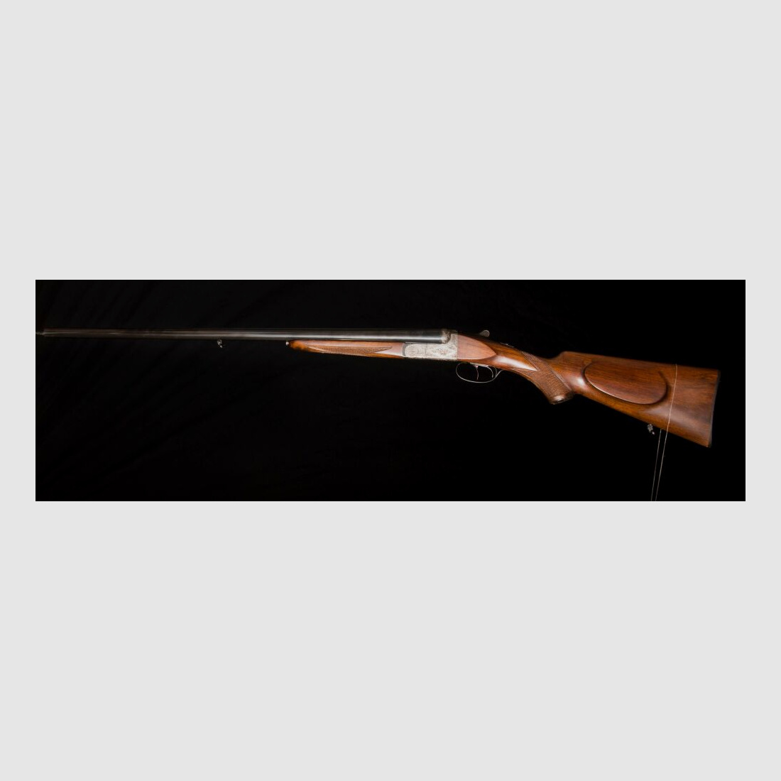 elegante Doppelflinte mit umfassender Gravur
