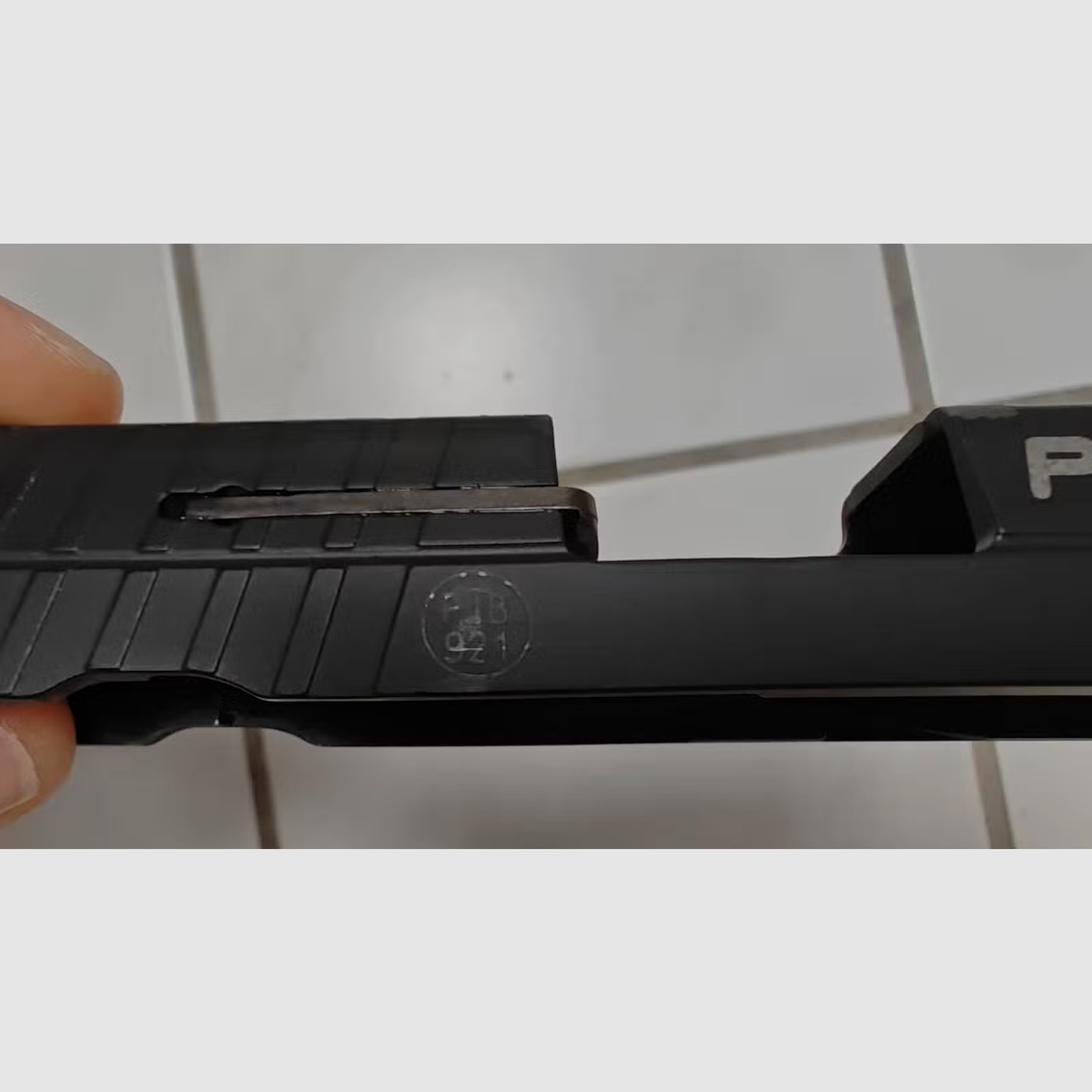 blued replacement / interchangeable slide lock for Umarex Walther PK380 9mm P.A.K. gas / blank firing pistol PtB 921