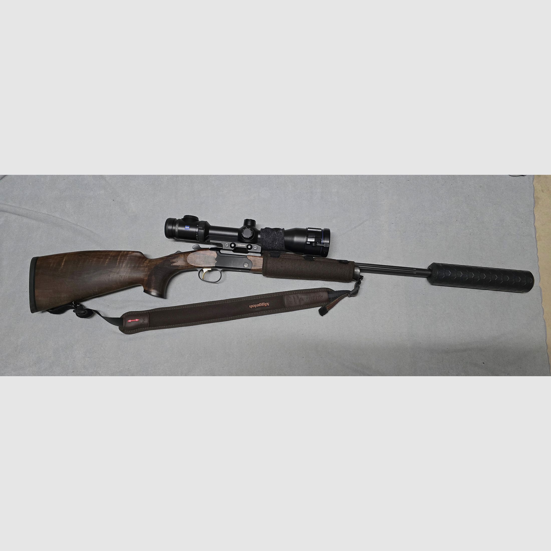 Merkel K5 Extrem with ZEISS V8 1.8-14x50 riflescope with rail and VANWARD Hunter PRO, overbarrel titanium suppressor for caliber .30