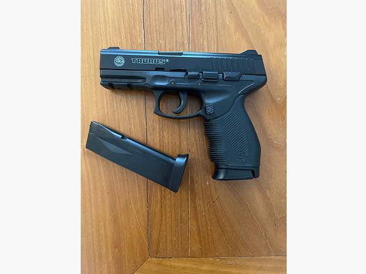 TAURUS Airsoft Pistole "PT 24/7" Metallschlitten Federdruck 0,5 Joule ab 14 J.