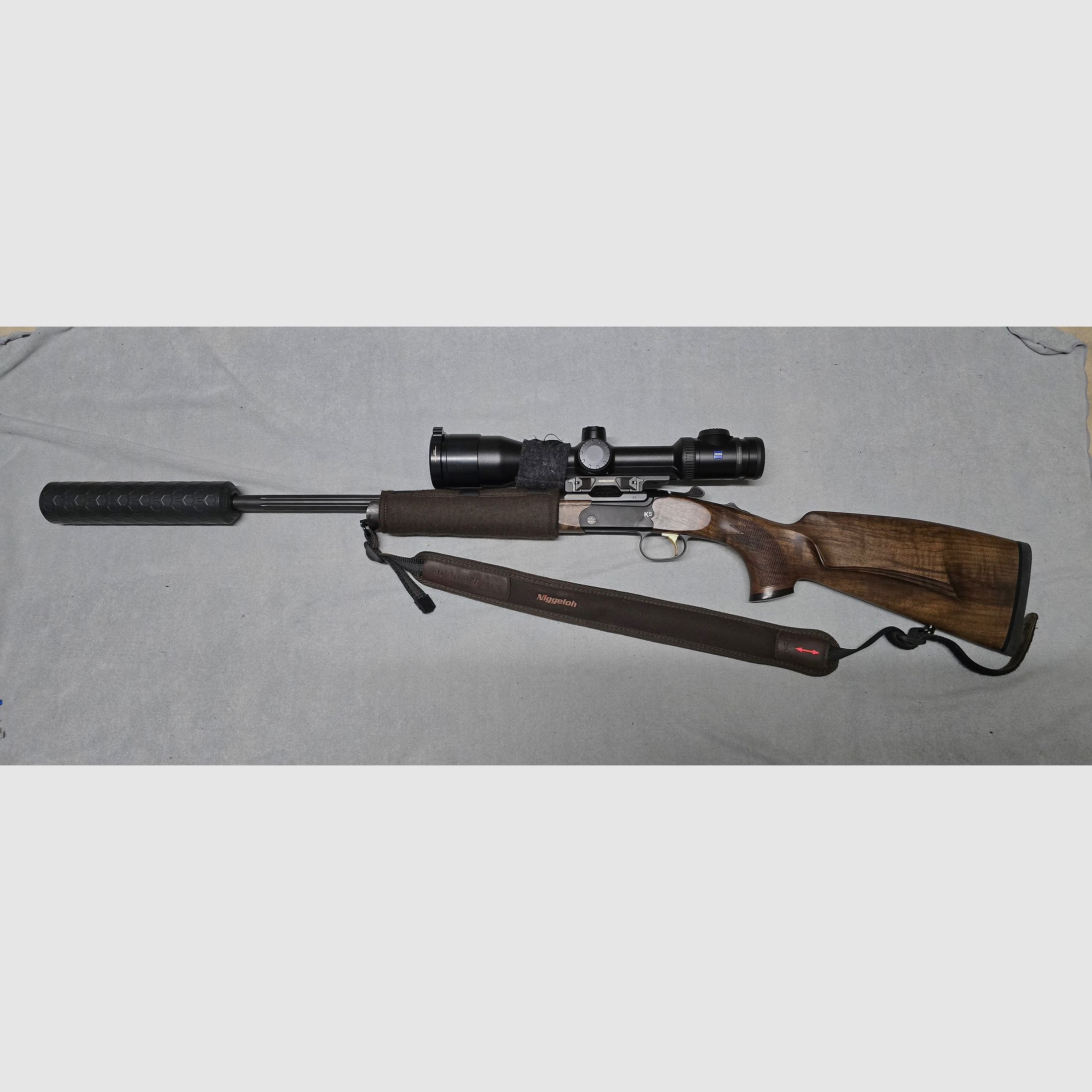 Merkel K5 Extrem with ZEISS V8 1.8-14x50 riflescope with rail and VANWARD Hunter PRO, overbarrel titanium suppressor for caliber .30