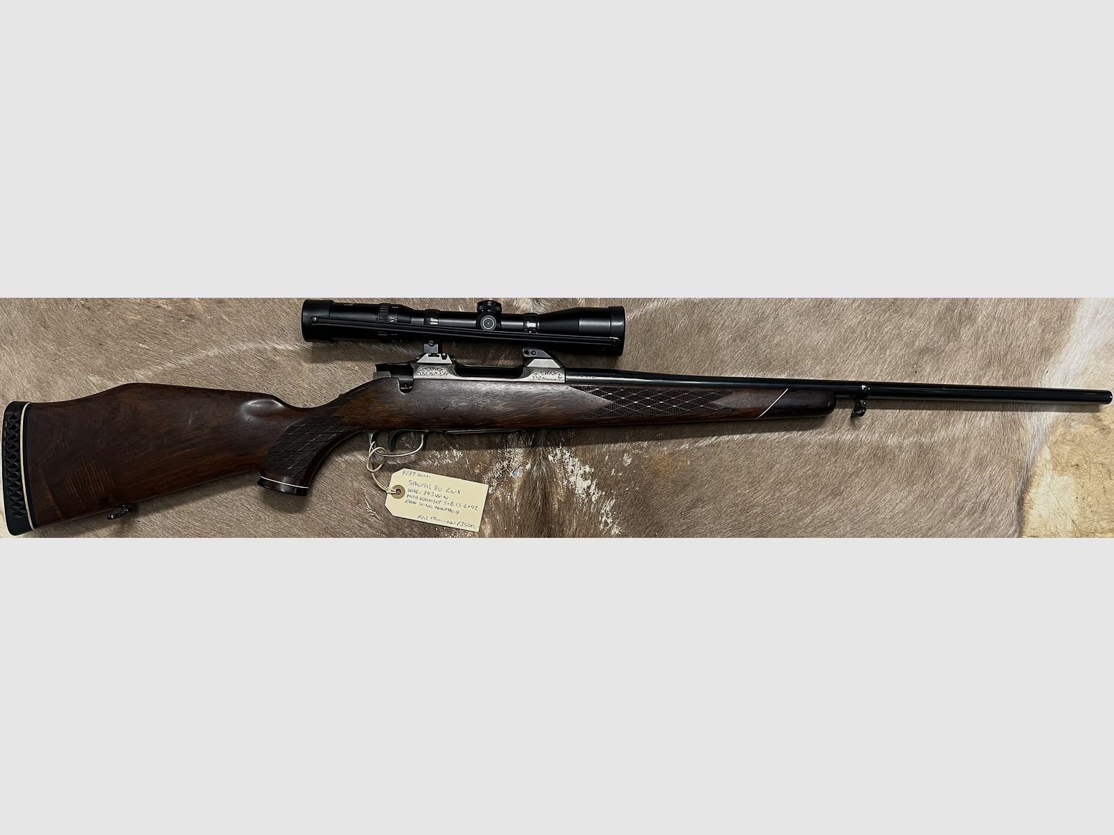 Brugt Sauer 80 LUX .243win Med kikkert SxB 1,5-6x42 incl EAW Sving montage, billede 1 af 3
