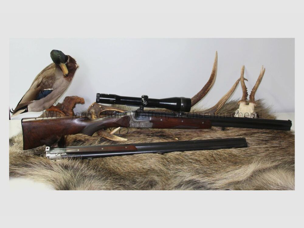 Merkel double-barreled shotgun with interchangeable double-barrel and variable sight 12/70; 7x57R