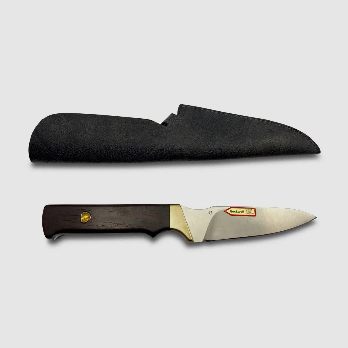 PUMA unicum "heart of gold" hunting knife with inset sapphire hearts