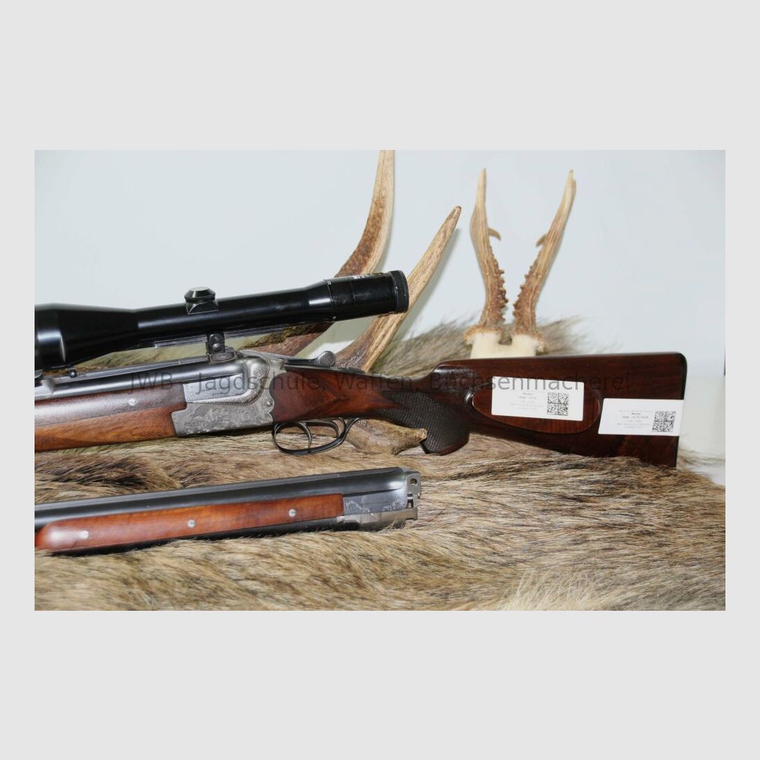 Merkel double-barreled shotgun with interchangeable double-barrel and variable sight 12/70; 7x57R