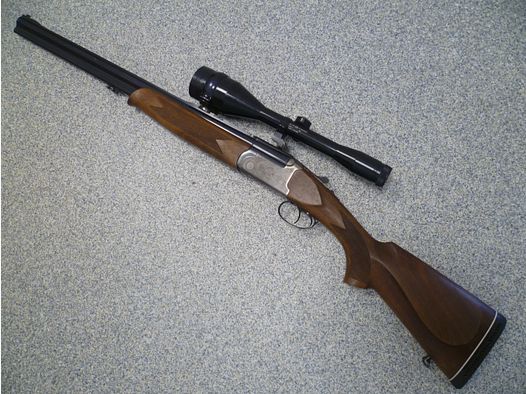 Escopeta de doble cañón Kettner modelo 2000 12/70 y 7x65R