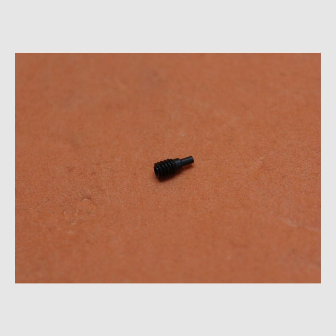 DPMS AR-15: Rear Sight Base Index Screw AR-15 A2 Matte DPMS retaining screw for the detent disk of the diopter sight, image 1 of 3