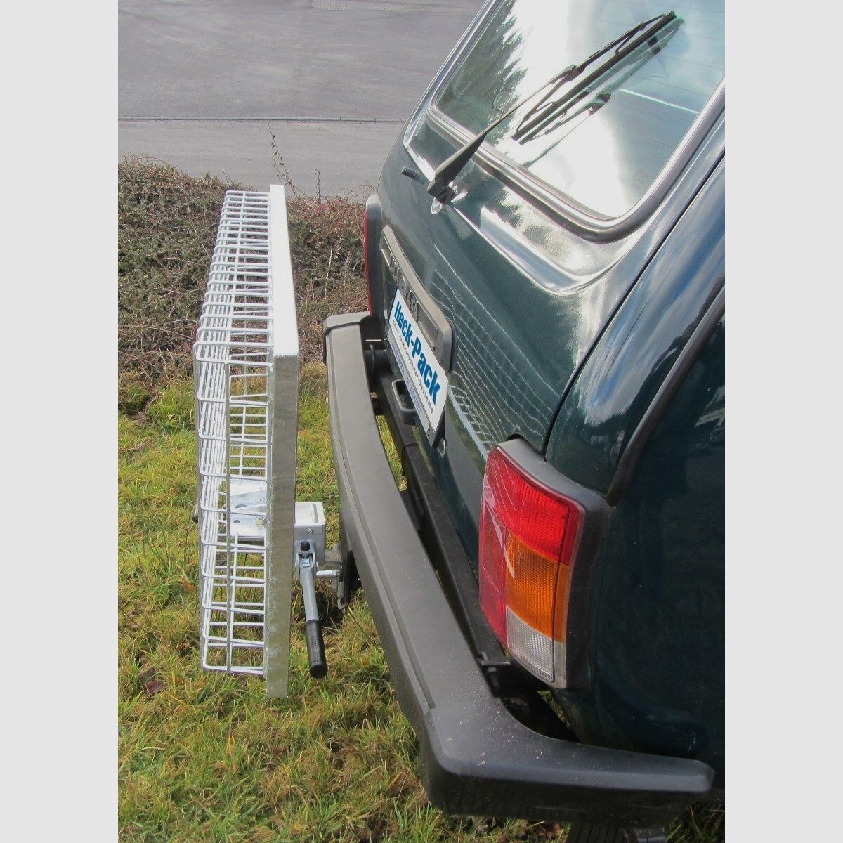 Heck-Pack Ein-und Aufklappvorrichtung