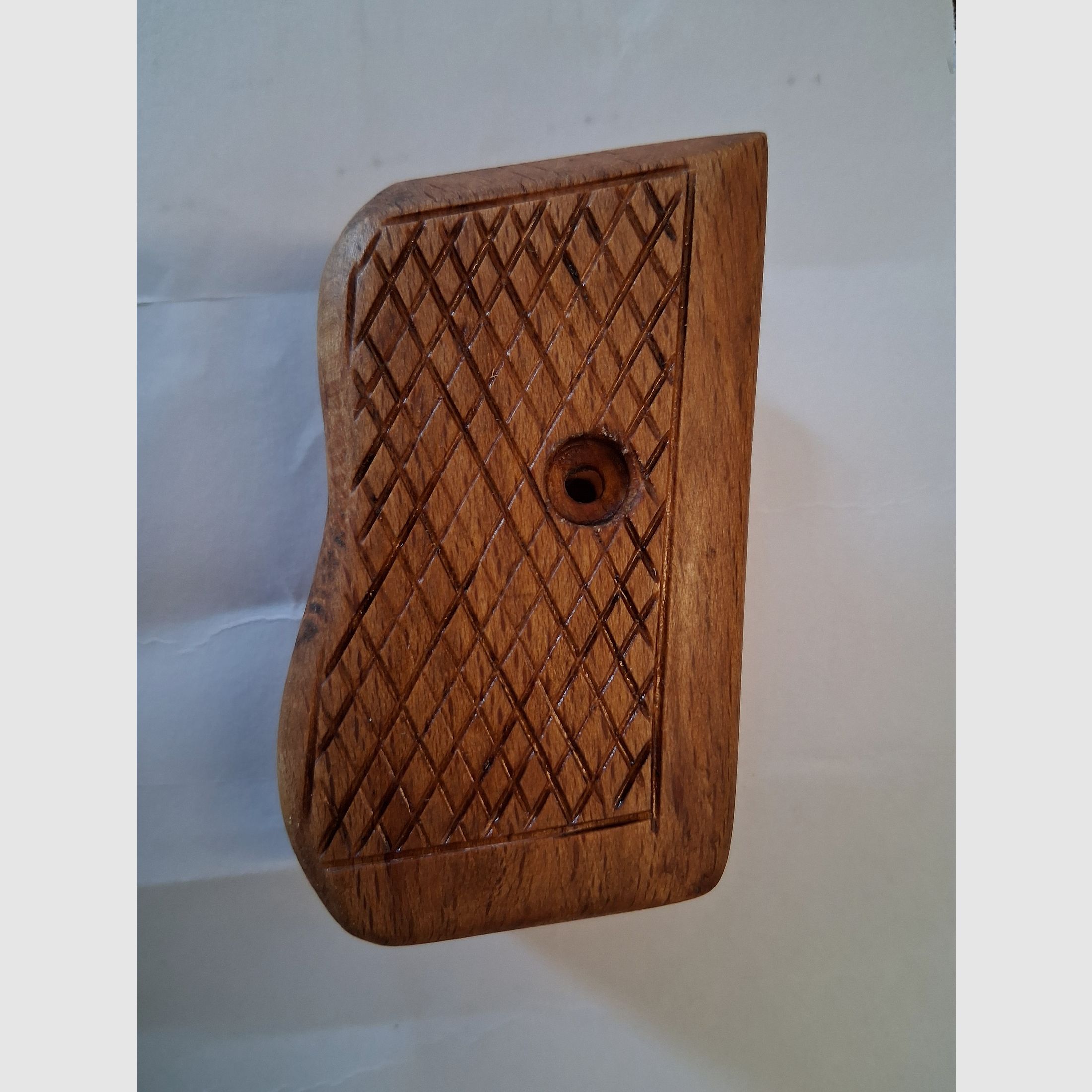Wooden grip panel for old Mauser pistol