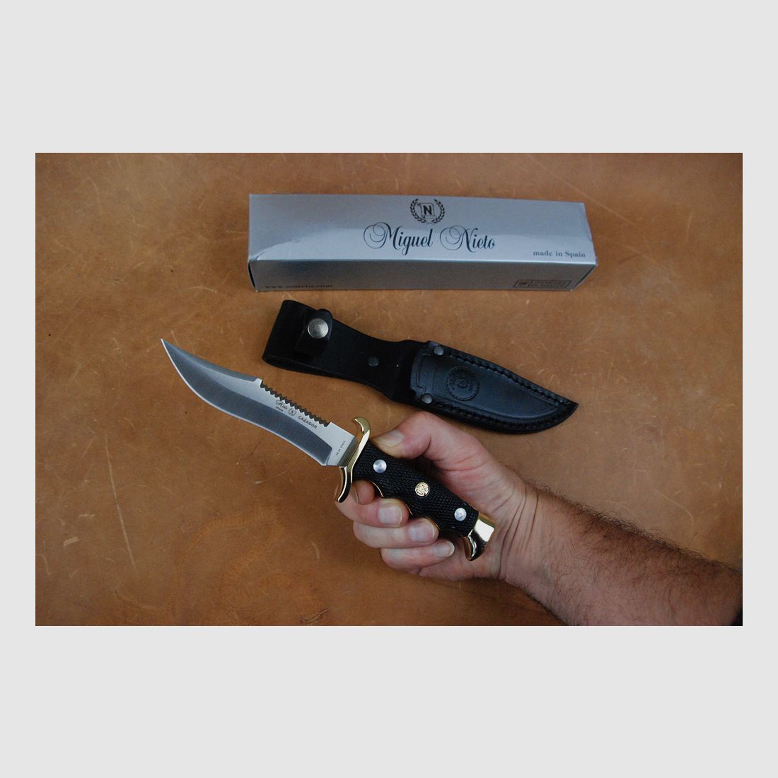 Knife, blade 11cm, brass fittings, leather sheath