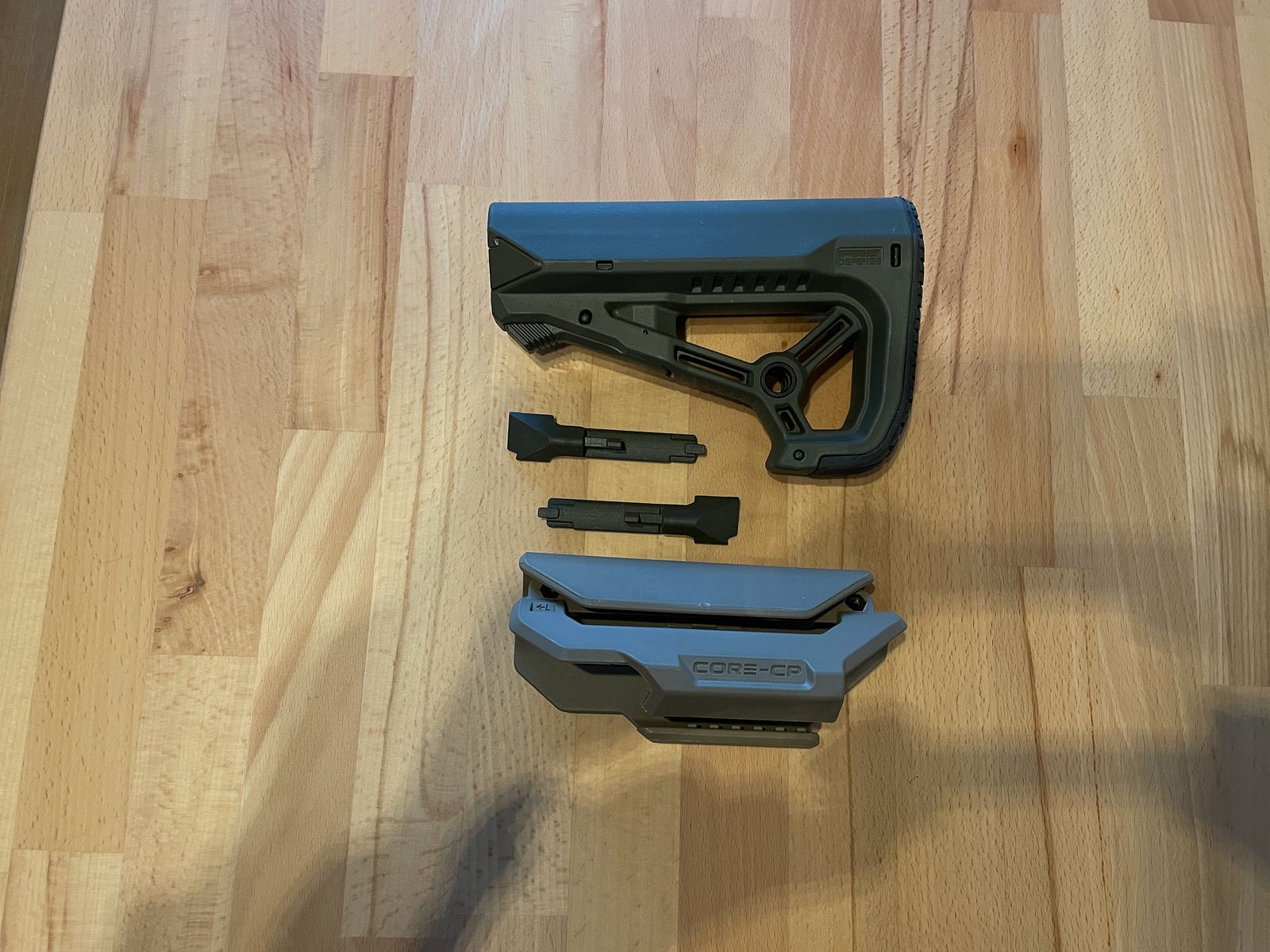 Push stock with cheek rest for AR15 models with adjustable tube diameter from FAB Defence.