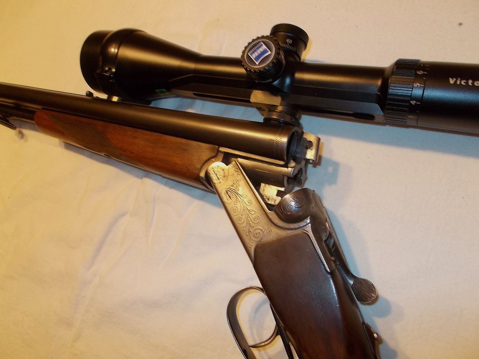 Suhler Jagddrilling 7x65R 12/70 mit Zeiss Diavari Optik mit Leuchtpunkt