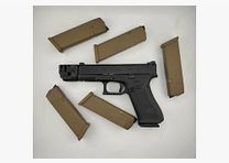Glock 45 in 9x19 with removable Massdriver compensator from Strike Industries