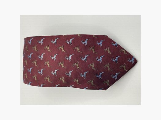 Corbata Robert Keyte 100% seda roja con motivo de ciervo plateado y marrón