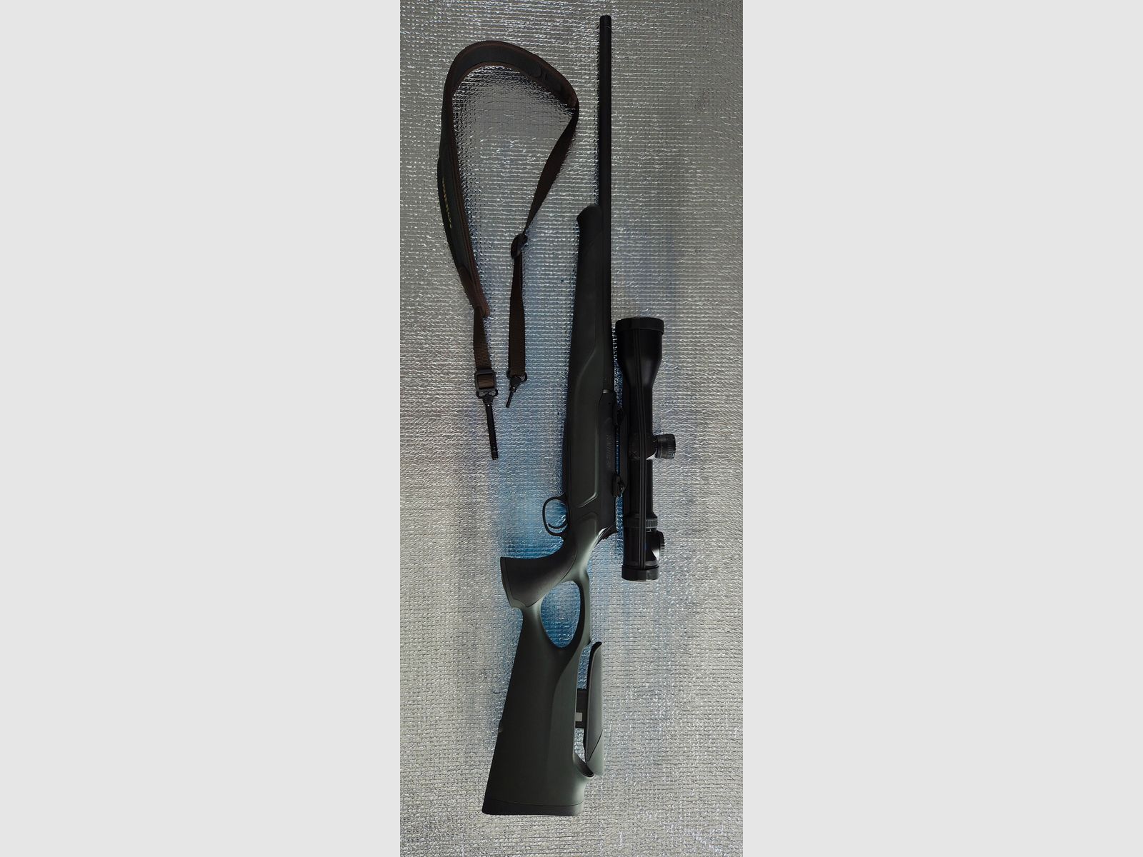 Sauer 404 Synchro XT (Sistema de acero) con mira telescópica y silenciador